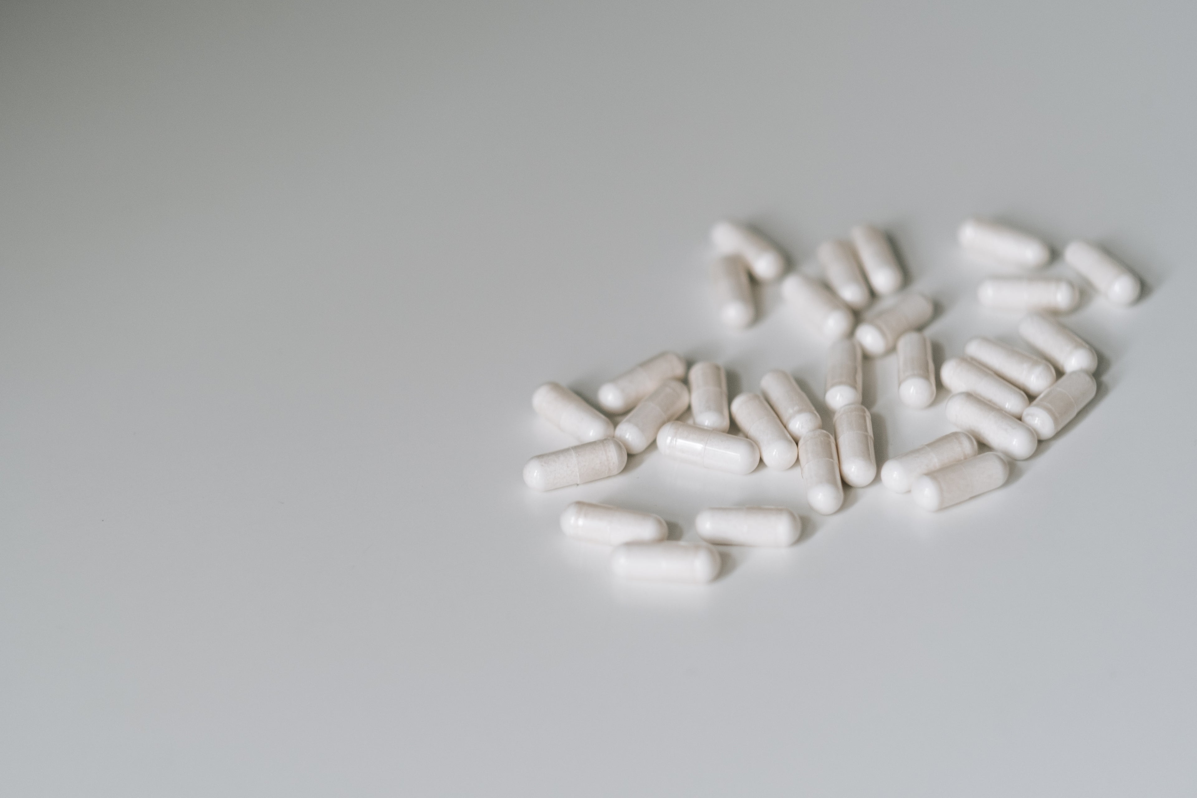 Supplement capsules arranged on a countertop